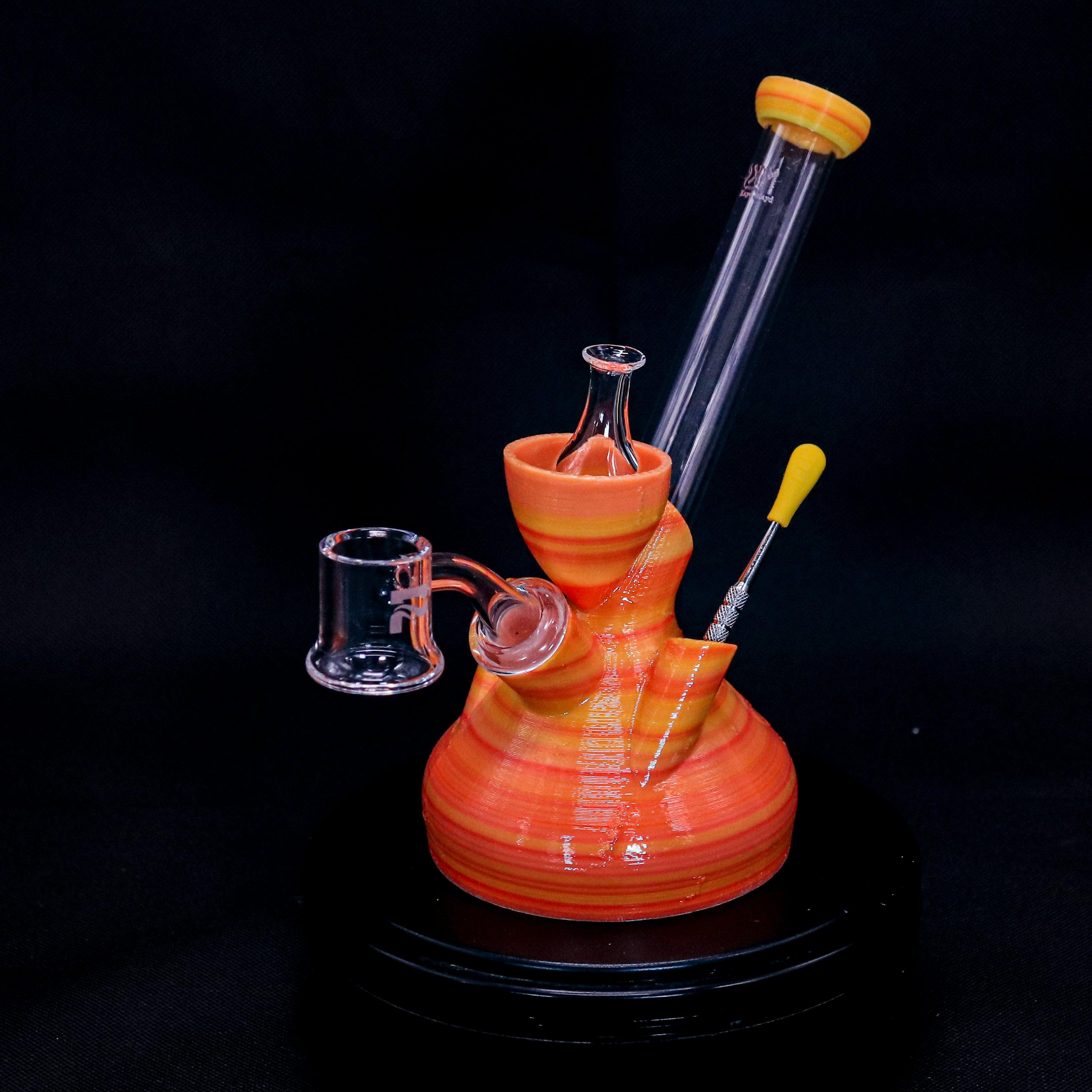 orange and yellow unbreakable shatterproof Dab Rig with quartz banger, dab tool and glass carb cap